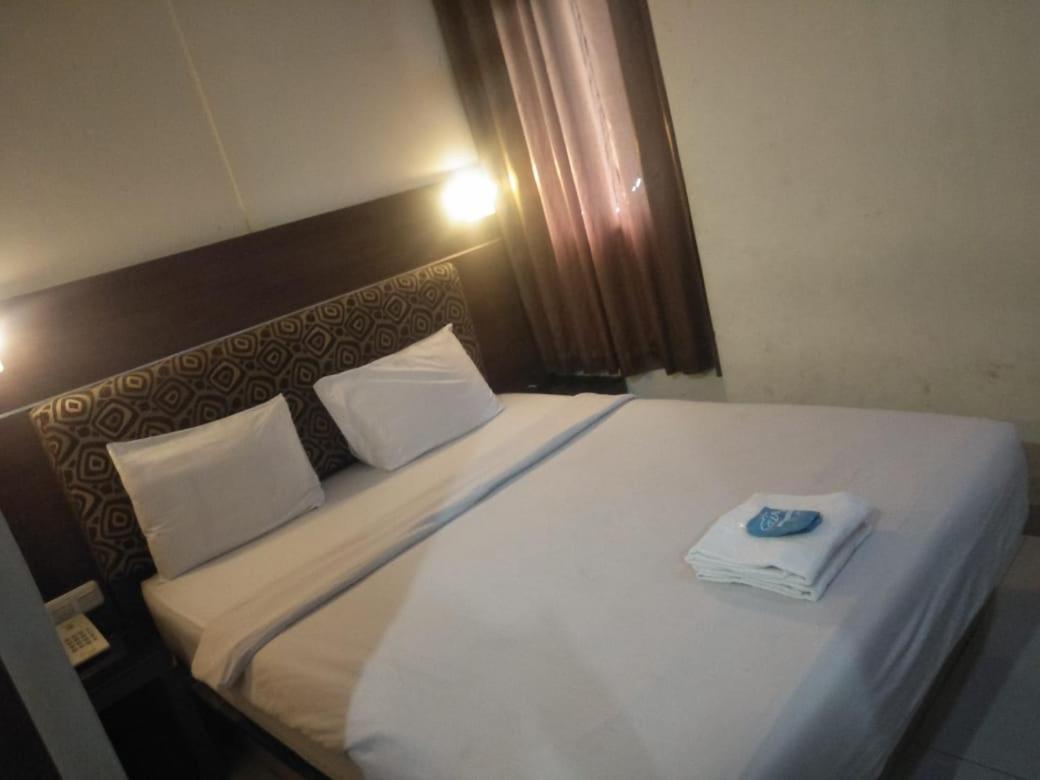 Penthouse Hotel Giacarta Esterno foto